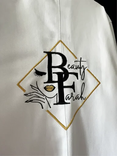 Logo von Beauty Farah mit stilisiertem Schriftzug und symbolischen Elementen.