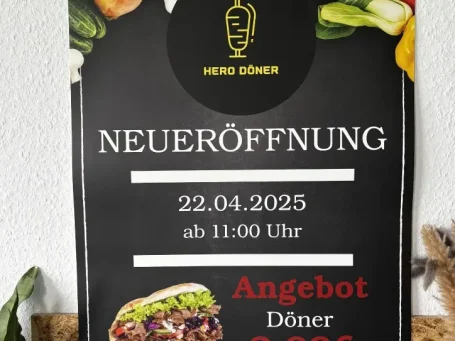 Plakat zur Neueröffnung eines Döner-Restaurants mit Datum und Angeboten.
